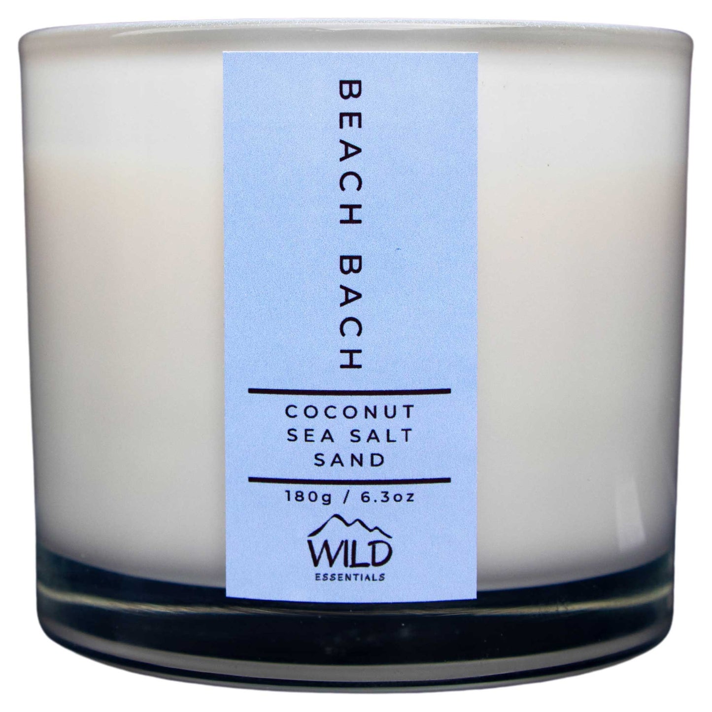 Photograph of the Luxurious Beach Bach Aromatherapy Candle by Wild Essentials with scents of Coconut, Sea Salt, and Sand.