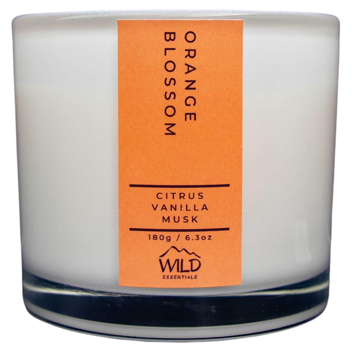 Photograph of the Luxurious Orange Blossom Aromatherapy Candle by Wild Essentials with scents of Citrus, Vanilla, and Musk.