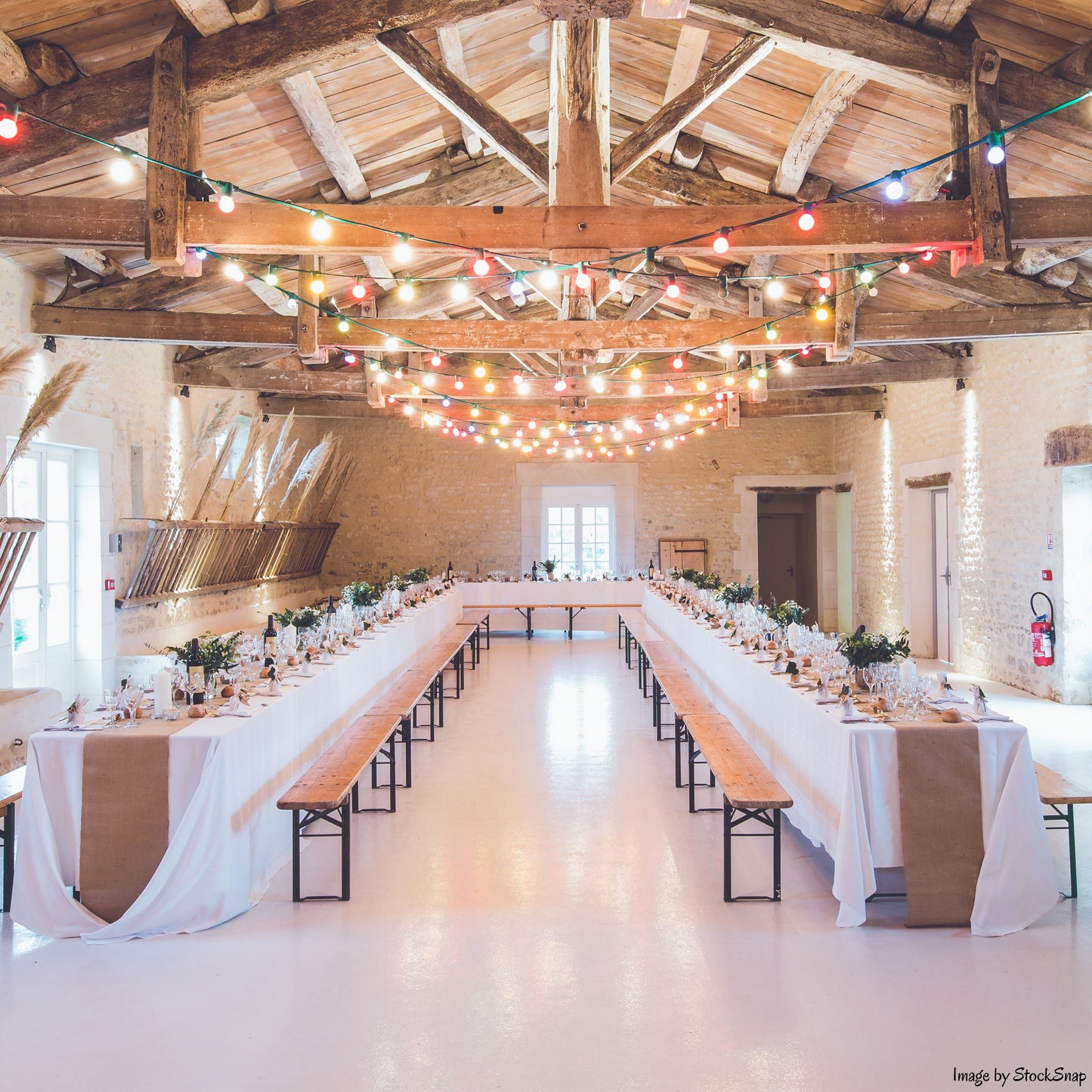 Photo of a wedding venue including wedding favour gifts on the tables
