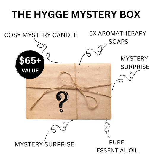 A picture of a box that has been wrapped up and the contents are unknown. It represents the Hygge-themed aromatherapy mystery box from Wild Essentials Limited.