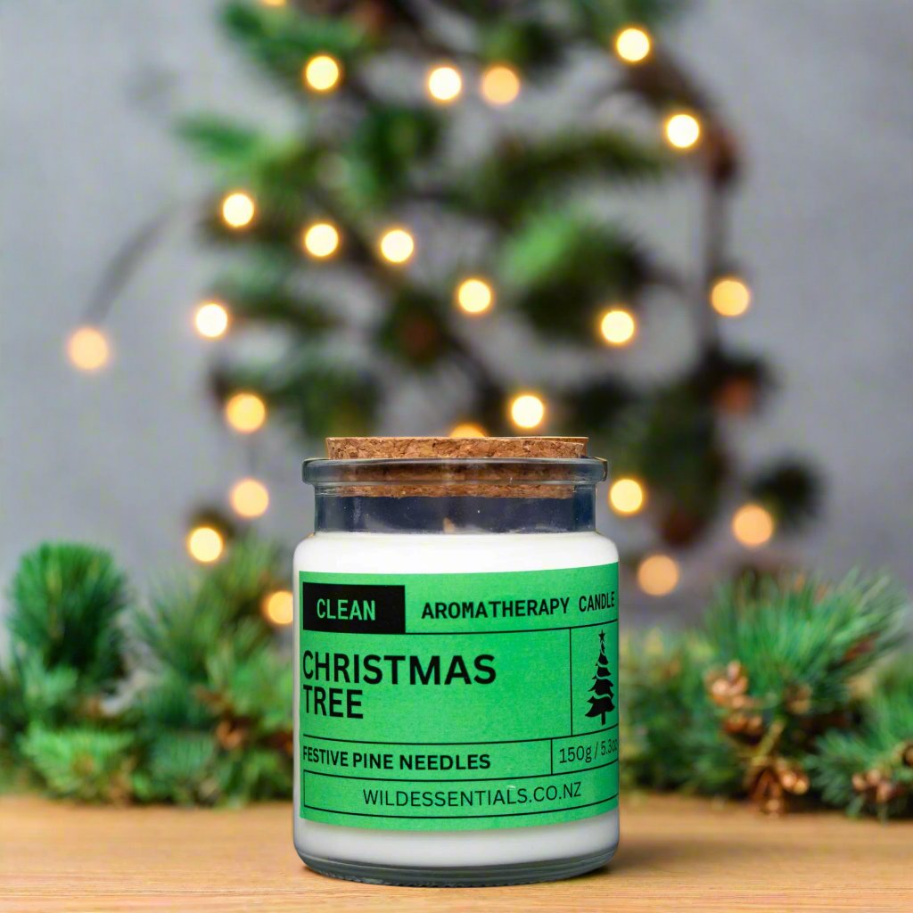 Photograph of the Christmas Tree Aromatherapy Candle by Wild Essentials with scents of Festive Pine Needles with background.